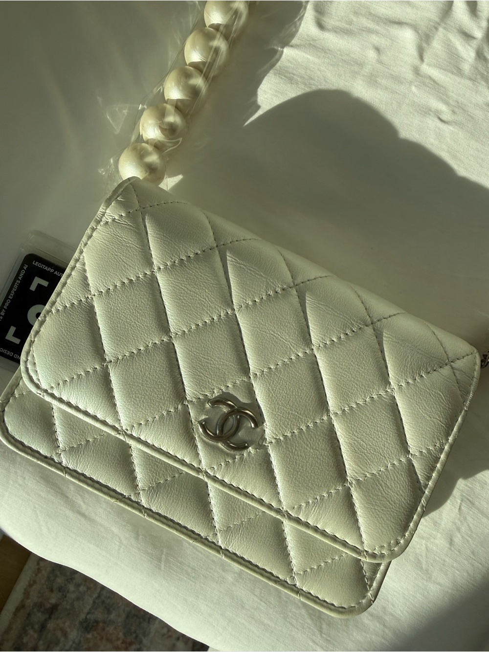 CHANEL White Quilted Pearl Strap Mini Bag